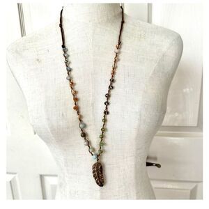 Long beaded feather pendant necklace